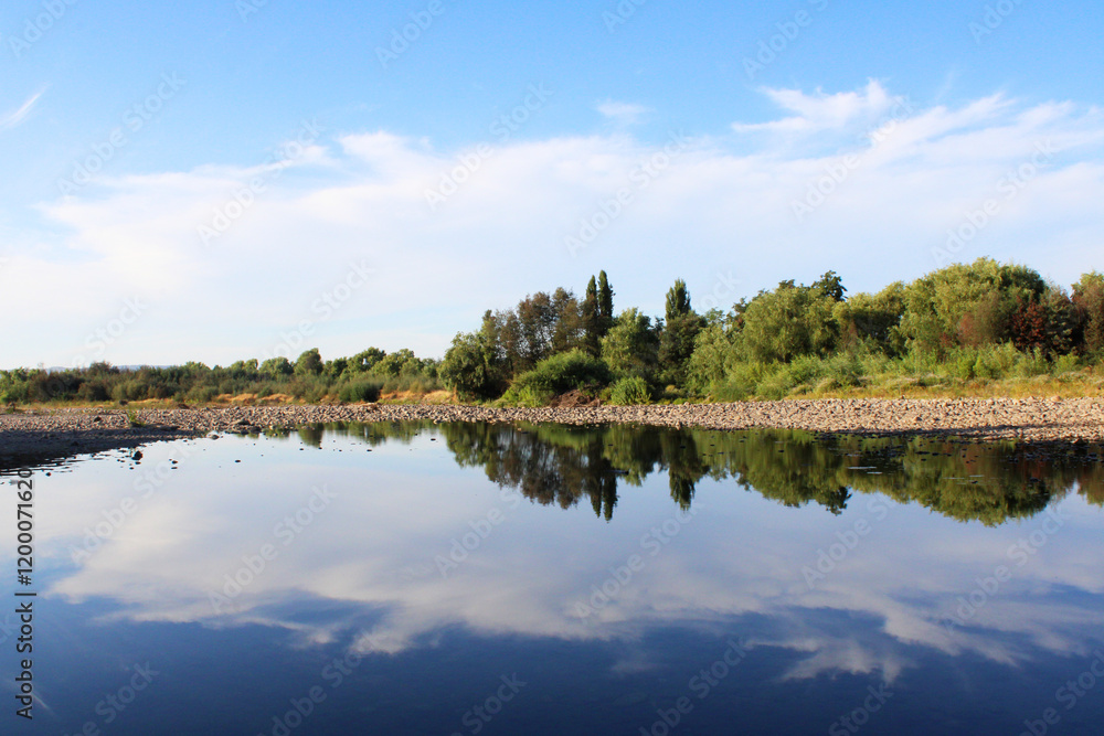 Landscape reflected in the water of the lake Landscape reflected in the water of the lake