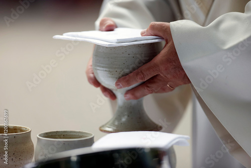 Sanctuary of La Benite Fontaine. Open air sunday catholic mass. Eucharist celebration. La Roche sur Foron..  France. photo