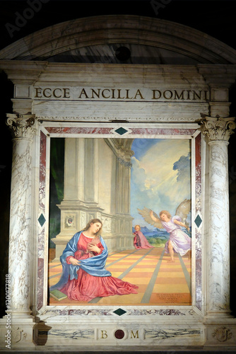 Treviso Cathedral.  The Annunciation by Titian from 1519 to 1520. Oil on canvas.  Treviso. Italy. photo