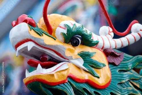 Chinese dragon in a buddhist temple. Decoration.  Tan Chau. Vietnam. photo