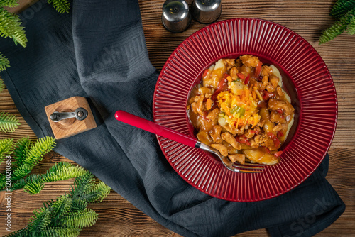 Obraz na płótnie Chicken fricassee with noodles and salad.