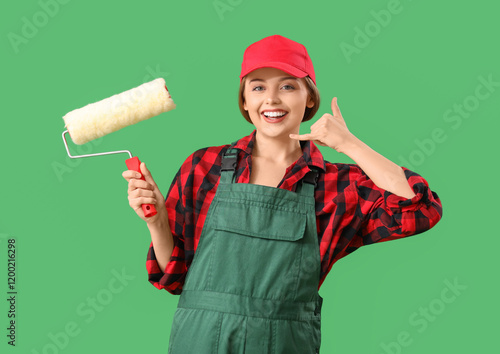 Female worker with paint ro...