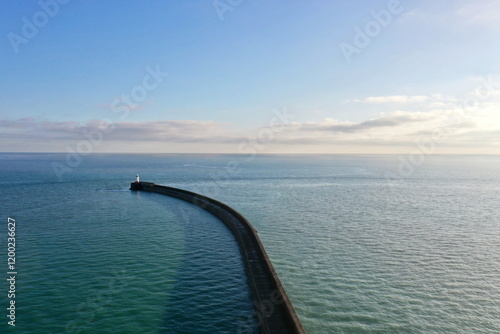 Aerial view of Newhaven harbour  wall or arm extending out to the ocean