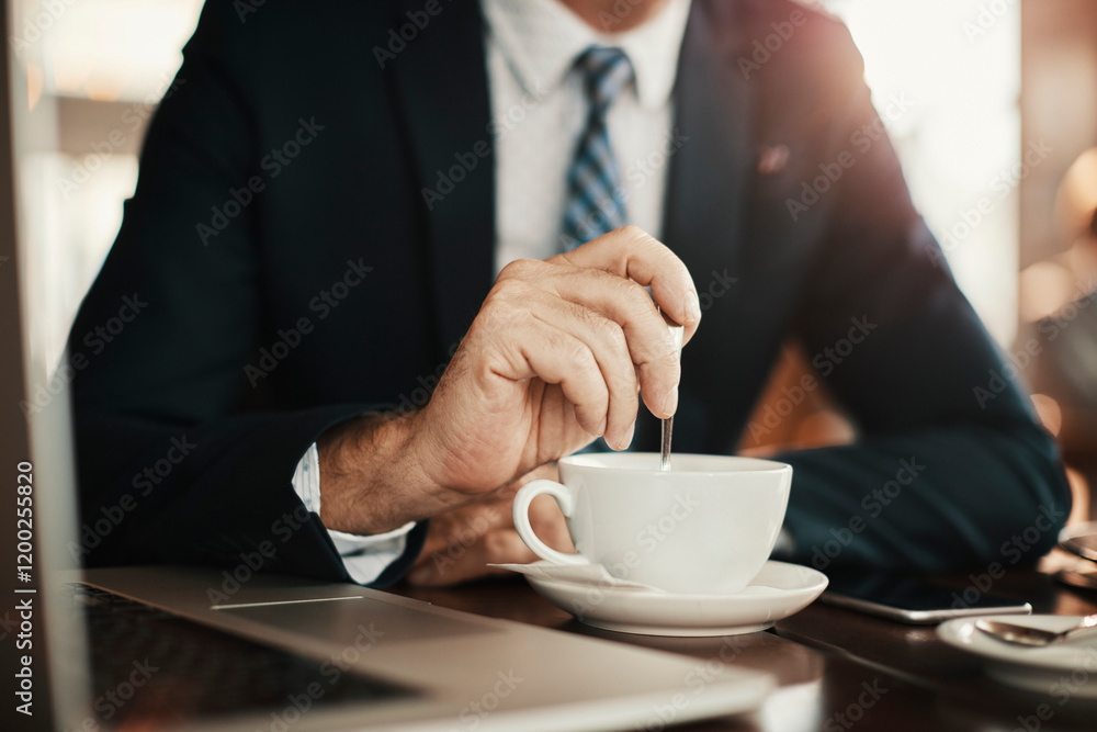 Professional businessman enjoying coffee while sitting in a modern cafe Professional businessman enjoying coffee while sitting in a modern cafe