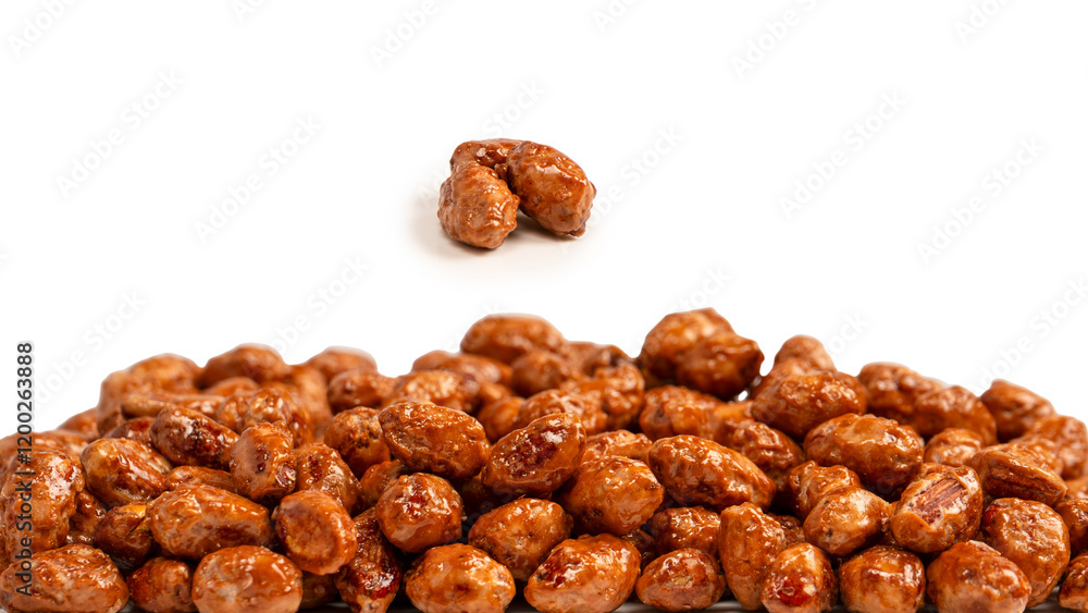 Tasty sweet roasted peanuts isolated on a white background. Tasty sweet roasted peanuts isolated on a white background.