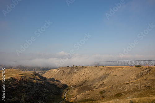 High level bridge in Lethbridge, Alberta covered in a morning fog photo