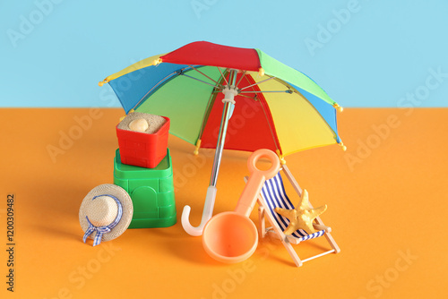 Wallpaper Mural Seashell, sand, beach toy molds, toy shovel, decorative hat and umbrella on color background Torontodigital.ca