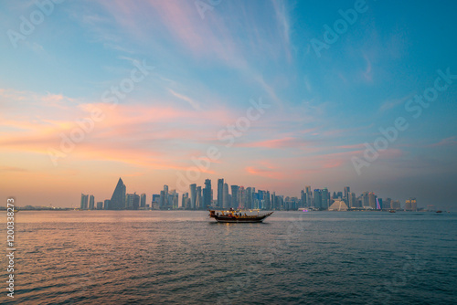 doha qatar skyscrapers by the sea at sunset and tour ship