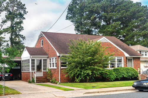 small nice brick house in a village near the atlantic ocean. photo