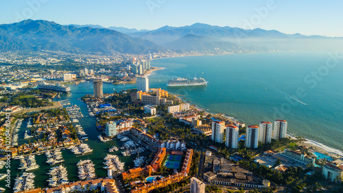 Puerto Vallarta skyline showing marina and cruise ships at sunset. Jalisco, Mexico