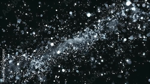 Glimmering particles on black background
