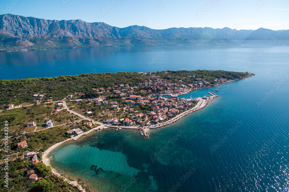 Naklejka premium Scenic Aerial View of Sucuraj Town on Hvar Island, Southern Croatia. Pristine Beaches, Mediterranean Charm, and Adriatic Sea