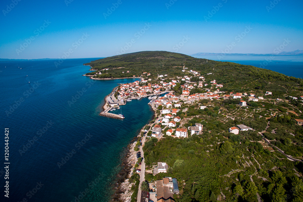 Fototapeta premium Scenic Aerial View of Sucuraj Town on Hvar Island, Southern Croatia. Pristine Beaches, Mediterranean Charm, and Adriatic Sea