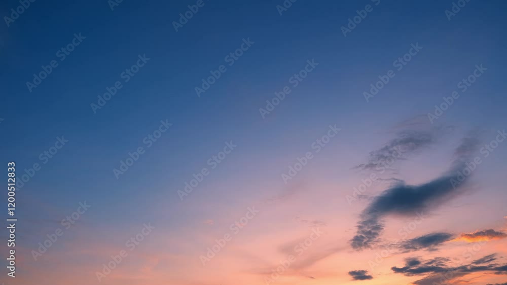 A time-lapse of the sunset, where the vibrant play of colors creates a romantic backdrop against the moving clouds. Sky cycles and air concept. Timelapse. 4K.
A time-lapse of the sunset, where the vibrant play of colors creates a romantic backdrop against the moving clouds. Sky cycles and air concept. Timelapse. 4K.