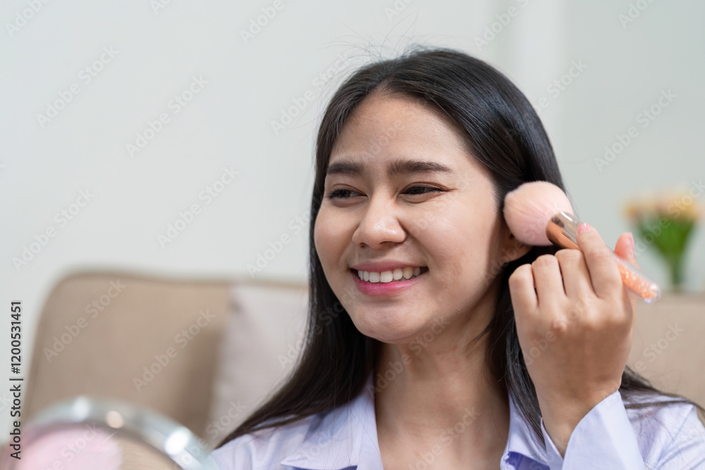 Beauty broker applying blush during a live broadcast makeup tutorial Beauty broker applying blush during a live broadcast makeup tutorial