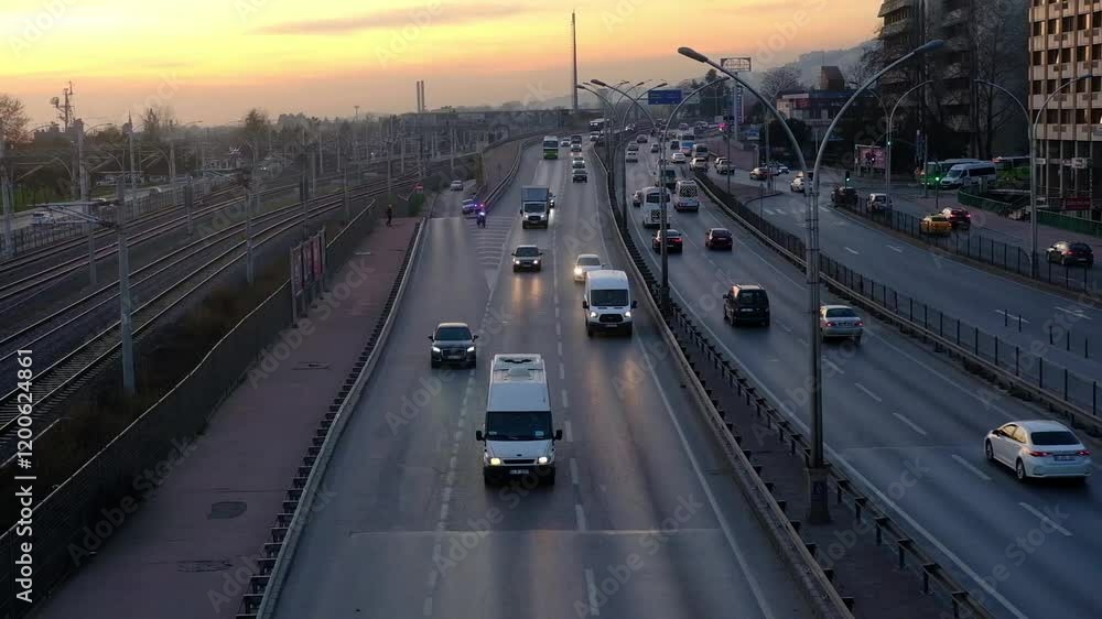 Vehicles moving on highway in reddish air