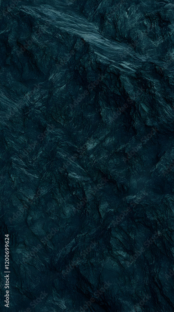 Naklejka premium Dark Teal Rock Formation Creates a Rugged Textured Landscape Background