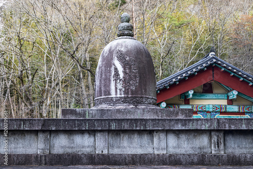 Hadong-gun, Gyeongsangnam-do, South Korea - March 30, 2024: Low angle view of stone sarira pagoda with carved flying angel on Ordination Platform at Ssanggyesa Temple photo