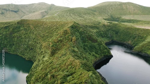 Aerial video footage of the calderira negra,Flores island on the volcano in azores, Fayal, Portugal photo