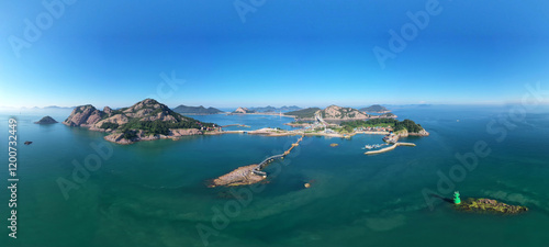 Aerial and panoramic view of uninhabited rock islands with deck trail and bridge on the sea against Daejangdo and Jangjado Islands near Seonyudo of Gunsan-si, South Korea photo