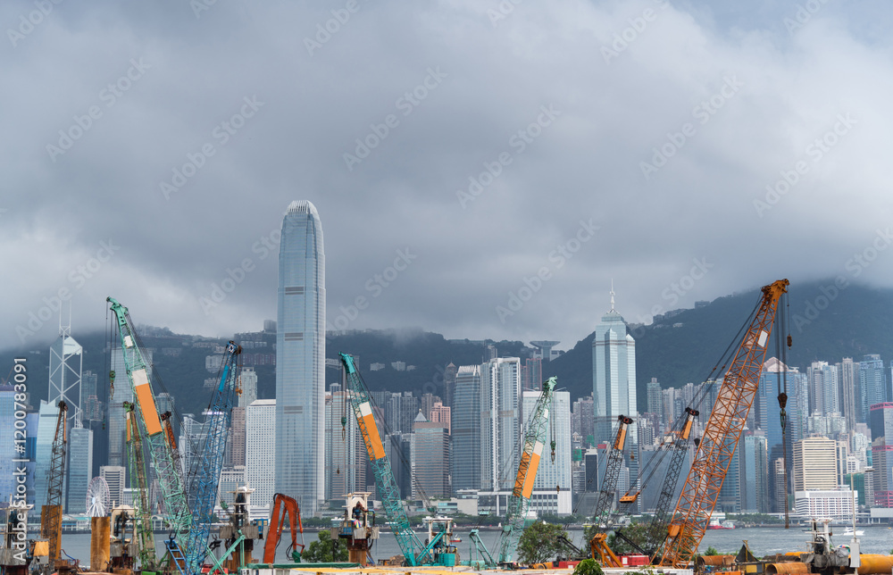 Naklejka premium Construction site in Hong Kong , with modern skylines in the background