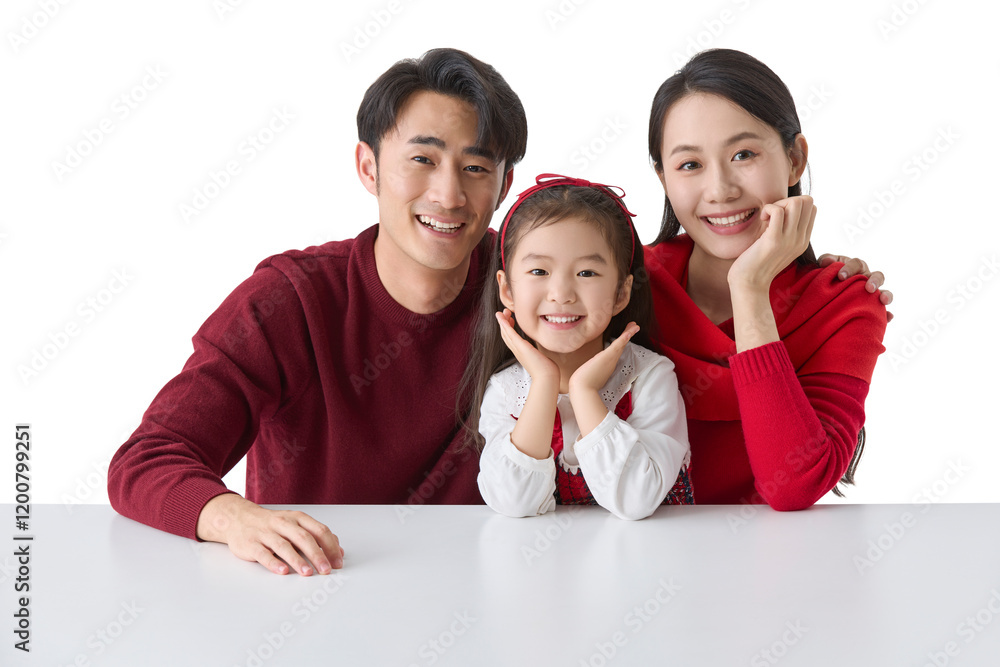Cheerful young family celebrating Chinese New Year Cheerful young family celebrating Chinese New Year