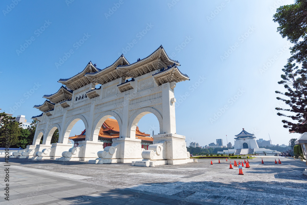 Fototapeta premium The main gate of National Chiang Kai-shek (CKS) Memorial Hall, the landmark for tourist attraction in Taiwan. st hand holding smartphone while taking a photograph of jiufen Culture Village Taipei, 