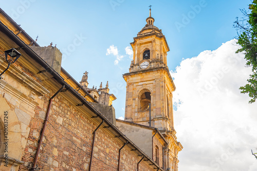 Historic Clock Tower in Bogotá's Candelaria, Showcasing Colonial Architecture Against a Blue Sky photo