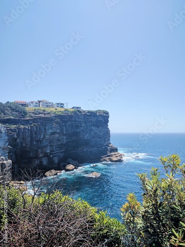 Photography Diamond Bay Cliffwalk lookout over the ocean on a sparlkling summer's day; also