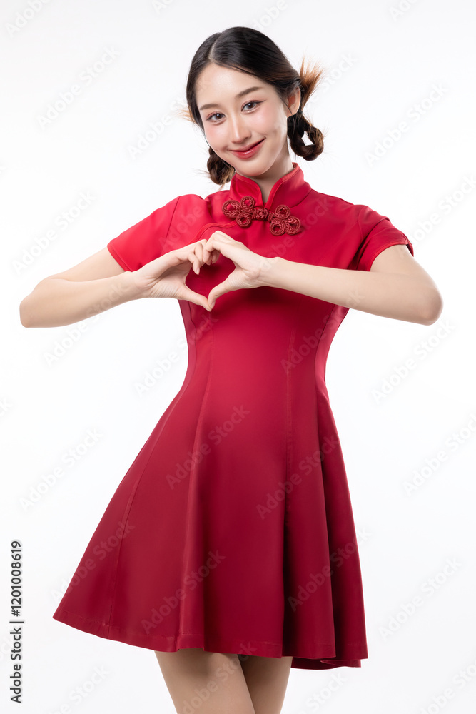 Portrait of joyful beauty Asian woman in red Cheongsam Chinese traditional dress celebrating and making heart shape hand sign isolated on white background. Portrait of joyful beauty Asian woman in red Cheongsam Chinese traditional dress celebrating and making heart shape hand sign isolated on white background.