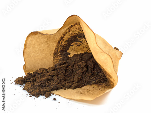Filter bag with coffee grounds against a white background