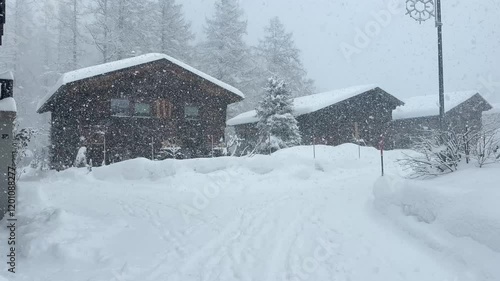 Wallpaper Mural Very heavy snowfall in an old village. Small huts and cabins in a snowstorm Torontodigital.ca