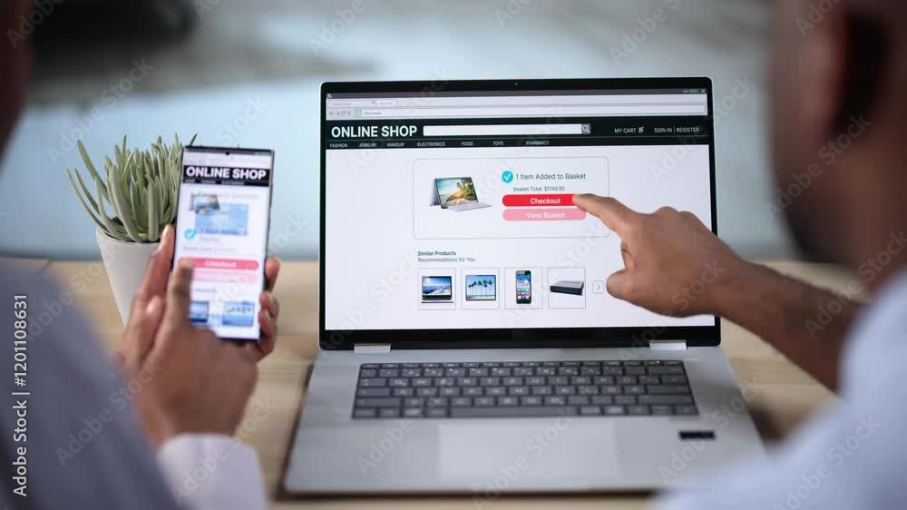 African Woman And Man Doing Online Shopping On Laptop African Woman And Man Doing Online Shopping On Laptop