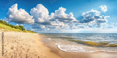 Fototapeta Naklejka Na Ścianę i Meble -  Panoramic view of the Baltic Sea with golden sandy beach under bright blue sky featuring fluffy white clouds and gentle waves on sunny summer day