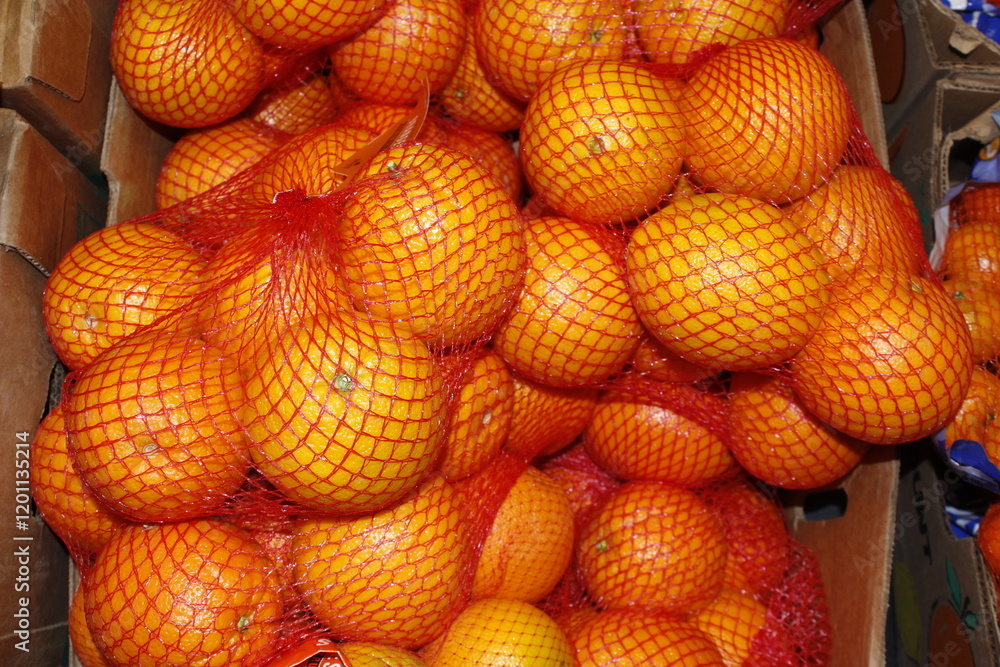 Oranges closeup bags shelf supermarket Oranges closeup bags shelf supermarket