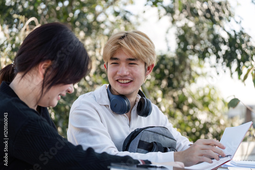 High School Students Collaborate on Homework and Projects in a Relaxed Outdoor Setting After School Hours photo