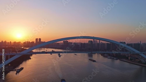 4K Real Time Aerial view of Lupu bridge and Huangpu River in Shanghai at sunset, China