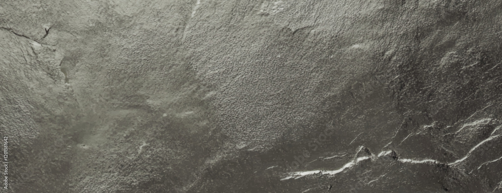 Naklejka premium Gray stone background with a rough texture. The background features a natural, uneven surface with gray tones throughout. Textured stone background vector. Gray background.