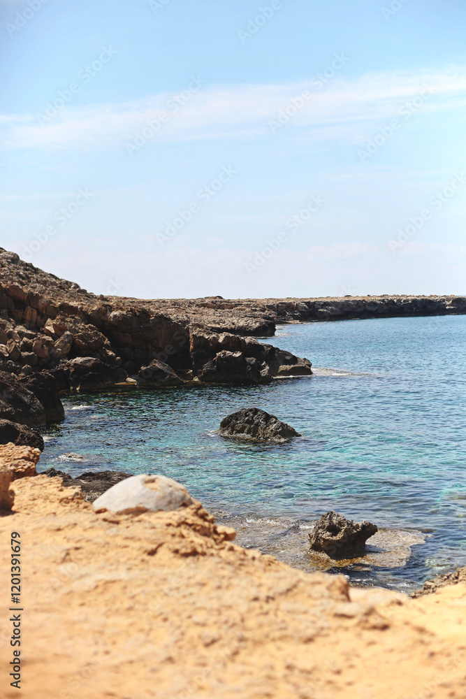 Cyprus Seascape: Rocky Coastline, Crystal Clear Waters, and Untouched Mediterranean Beauty Cyprus Seascape: Rocky Coastline, Crystal Clear Waters, and Untouched Mediterranean Beauty
