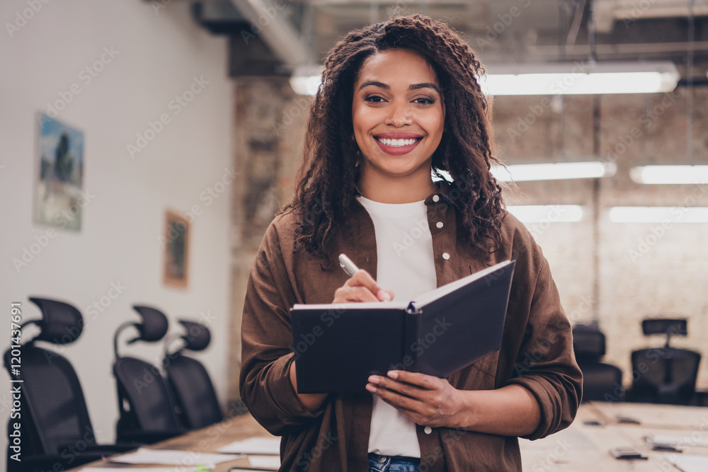 Girl writing in notebook