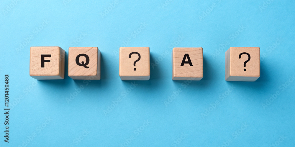 Frequently Asked Questions: Concept on Wooden Cubes Against a Blue Background Frequently Asked Questions: Concept on Wooden Cubes Against a Blue Background