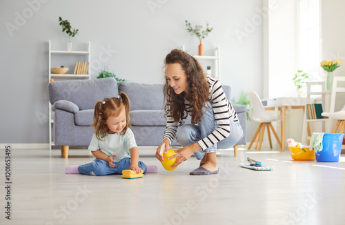 Obraz na plátně Happy educational pastime, developing creativity skill in kid, mother and her sm