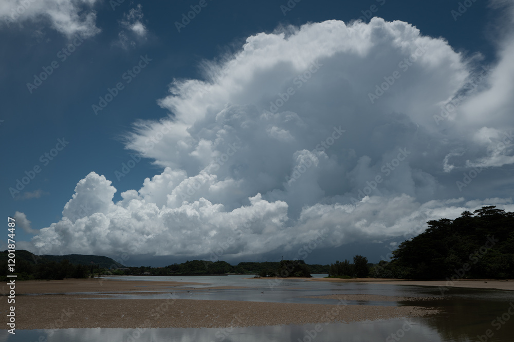 Dramatic Cumulonimbus Clouds over a Tropical Shoreline Dramatic Cumulonimbus Clouds over a Tropical Shoreline