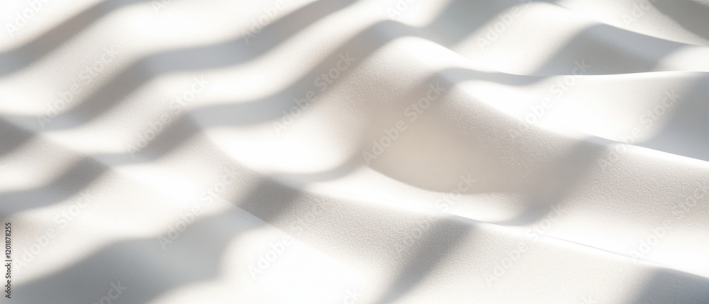Fototapeta premium Soft white fabric with layered shadows and highlights creates serene atmosphere. gentle waves and textures evoke sense of calm and elegance