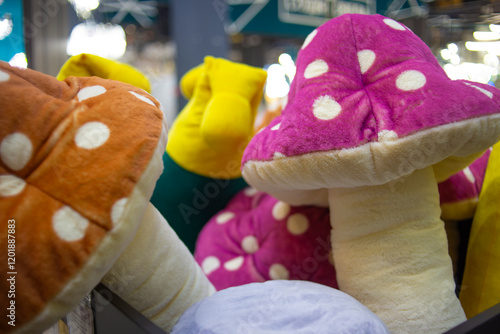 funny soft toys in the shape of huge mushrooms photo