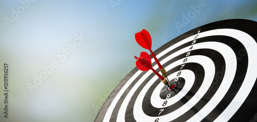 Konstfotografi two darts on target with blur background