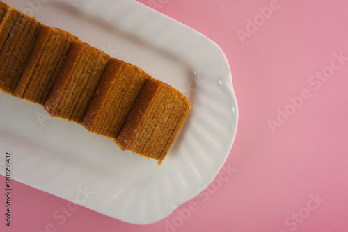 Lapis legit or spekuk (Dutch: Spekkoek) is a type of traditional wet cake from Indonesia. photo