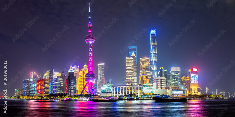 Shanghai skyline at the Bund with Oriental Pearl Tower downtown Pudong panorama at night in China