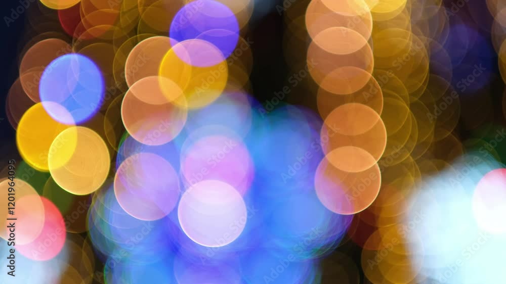 Background of Christmas colorful flashing lights with bokeh effect.