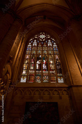 Stained glass window illuminating the cathedral of st. Michael and st. Gudula in brussels. Belgium tourism photo